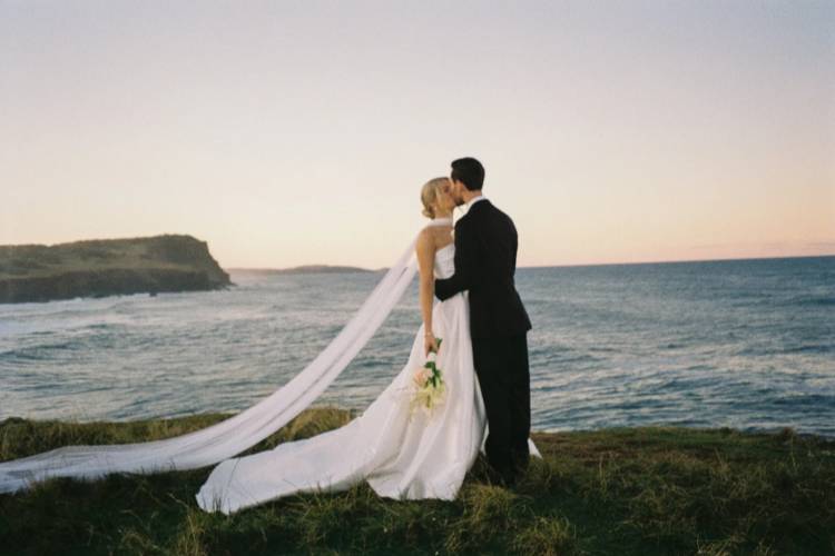 Nostalgic film photography of newlyweds on the Northern Beaches by Jason Corroto