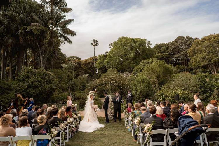 Bride and groom getting married at garden wedding estate in Sydney's Vaucluse