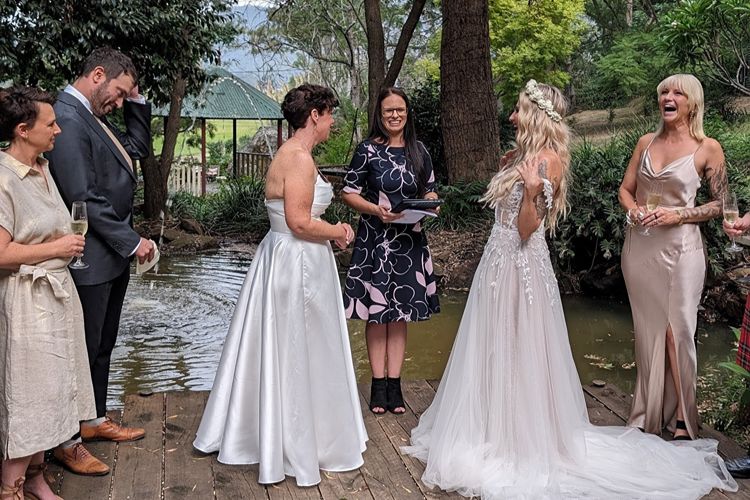 Lesbian wedding ceremony with two brides by celebrant Kellie from Elegant Hearts
