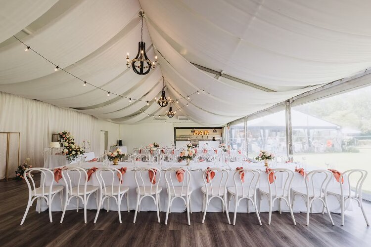 Permanent marquee wedding reception at Burnham Grove with chandelier lighting