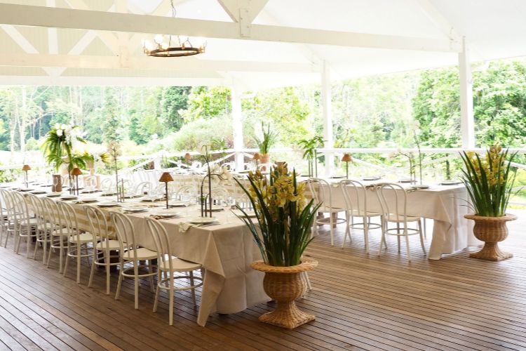 Outdoor barn wedding venue surrounded by rainforest at Nightcap Ridge