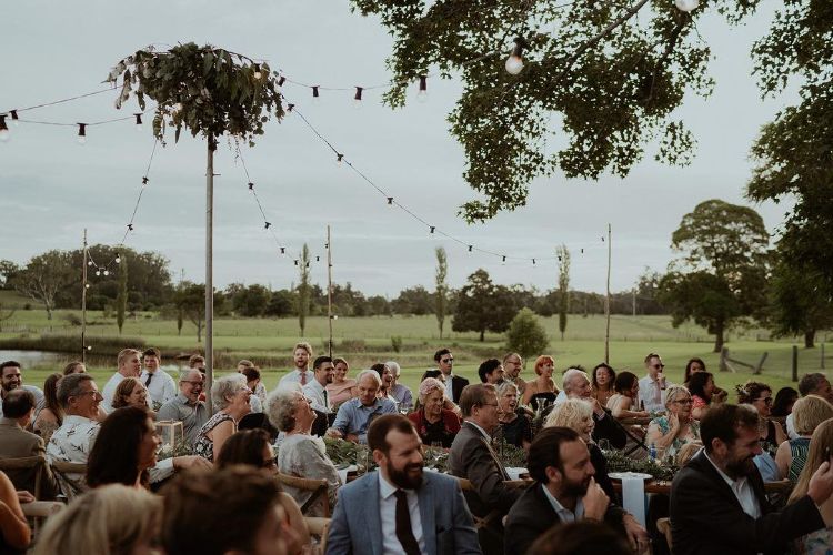 Private property wedding with guests seated outside at Willow Farm Berry