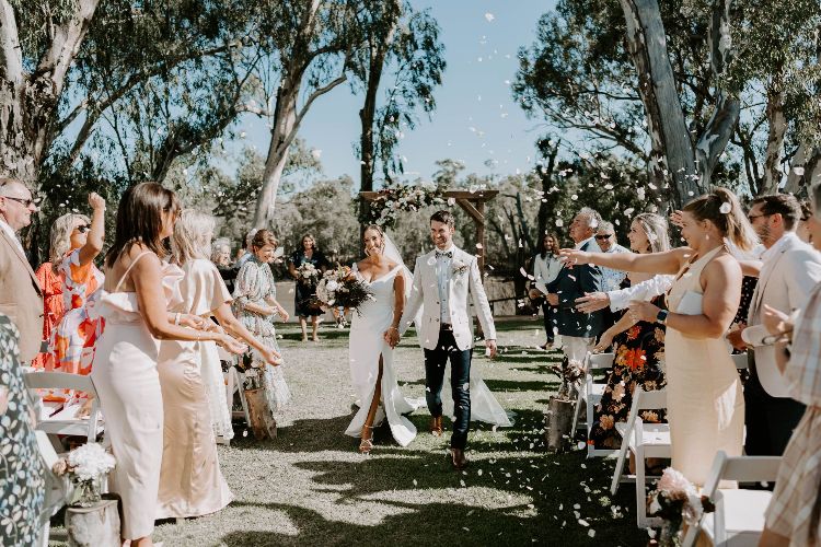 Riverfront wedding ceremony at Tindarra Resort