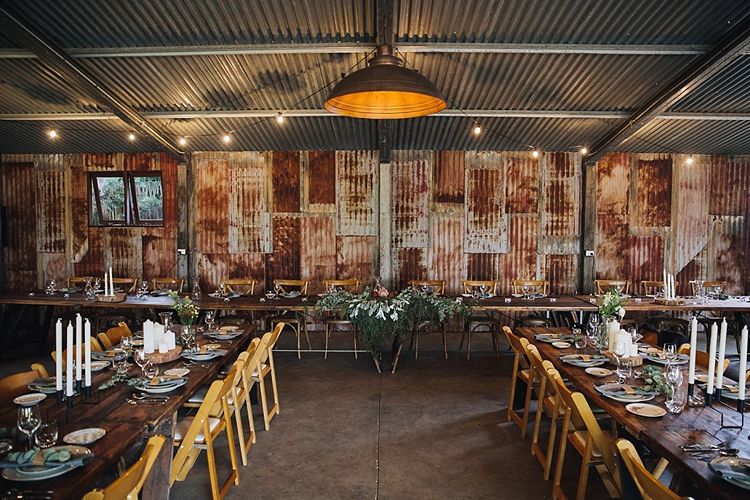 Rustic entertainment barn set up for reception at Willow Farm