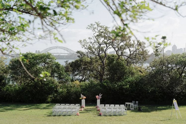 Sydney Harbour garden wedding ceremony with Harbour Bridge views at Athol Hall