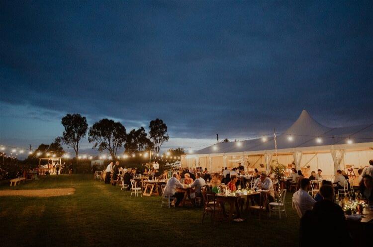 Outdoor wedding reception at Figbird Cottage