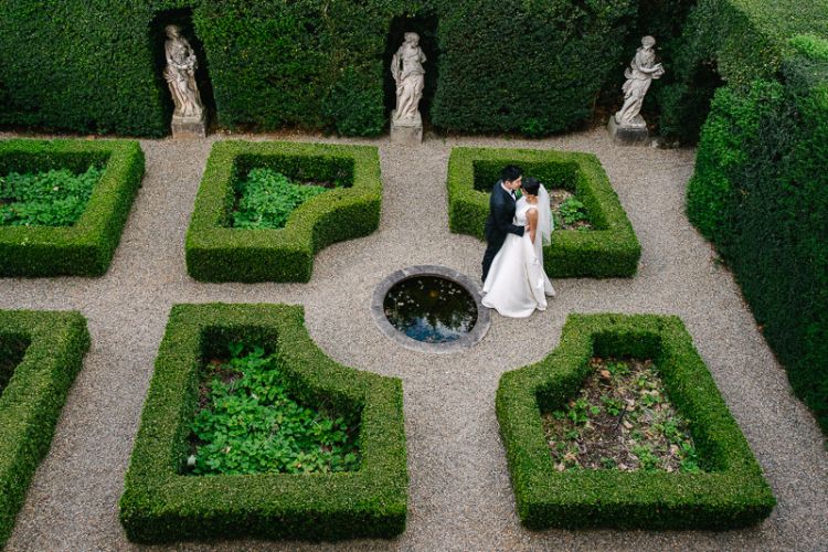 Couple in formal parterre garden at Lindesay House, a heritage garden venue